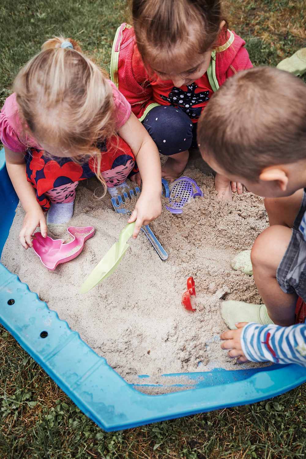 Children playing on the sand