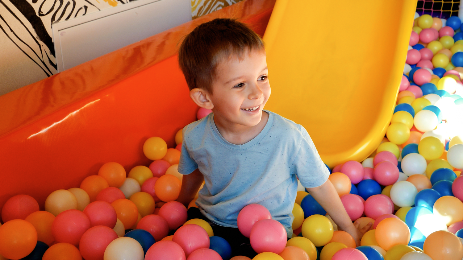 Boy playing with balls