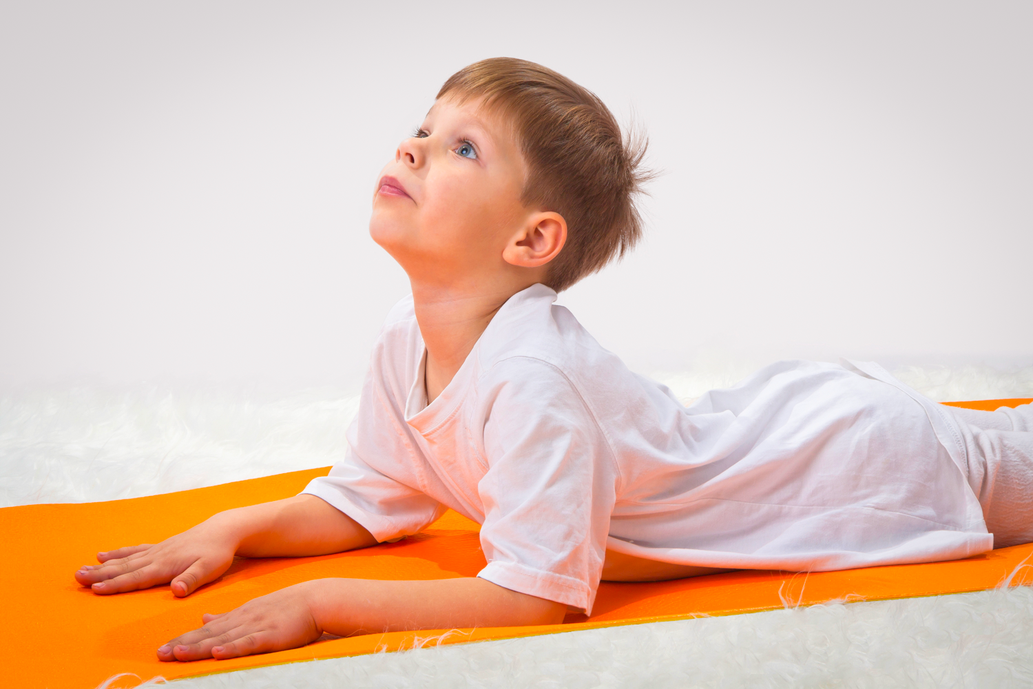 A little boy working on enhancing body sensations