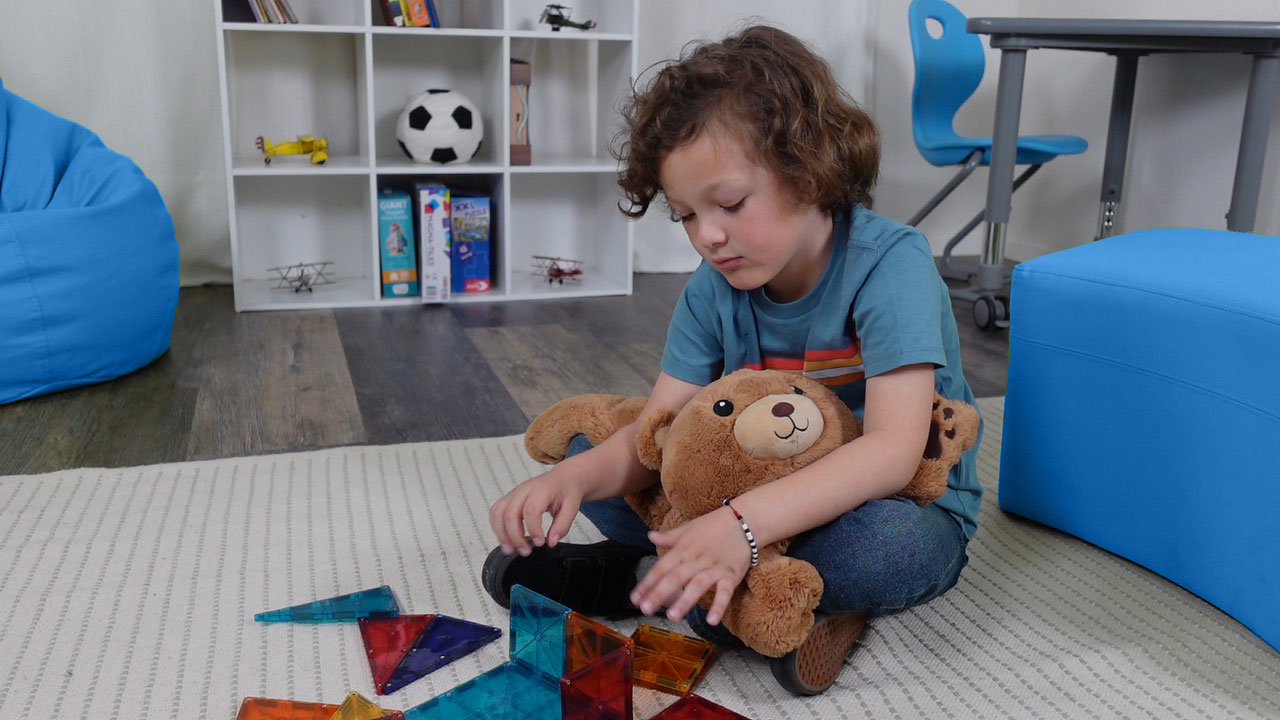 Nico playing with magnets