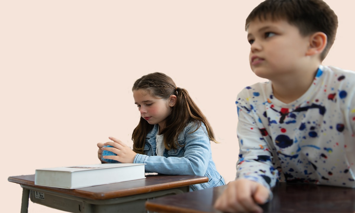 Two school kids positive sensory experiences and positive behaviors while managing head banging